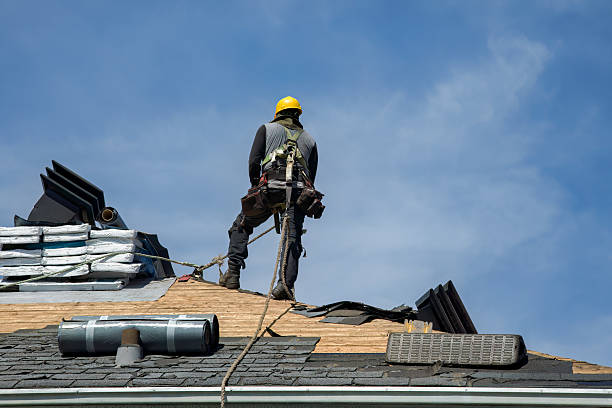 Professional Roof Replacement technician working in West Baldwin, ME